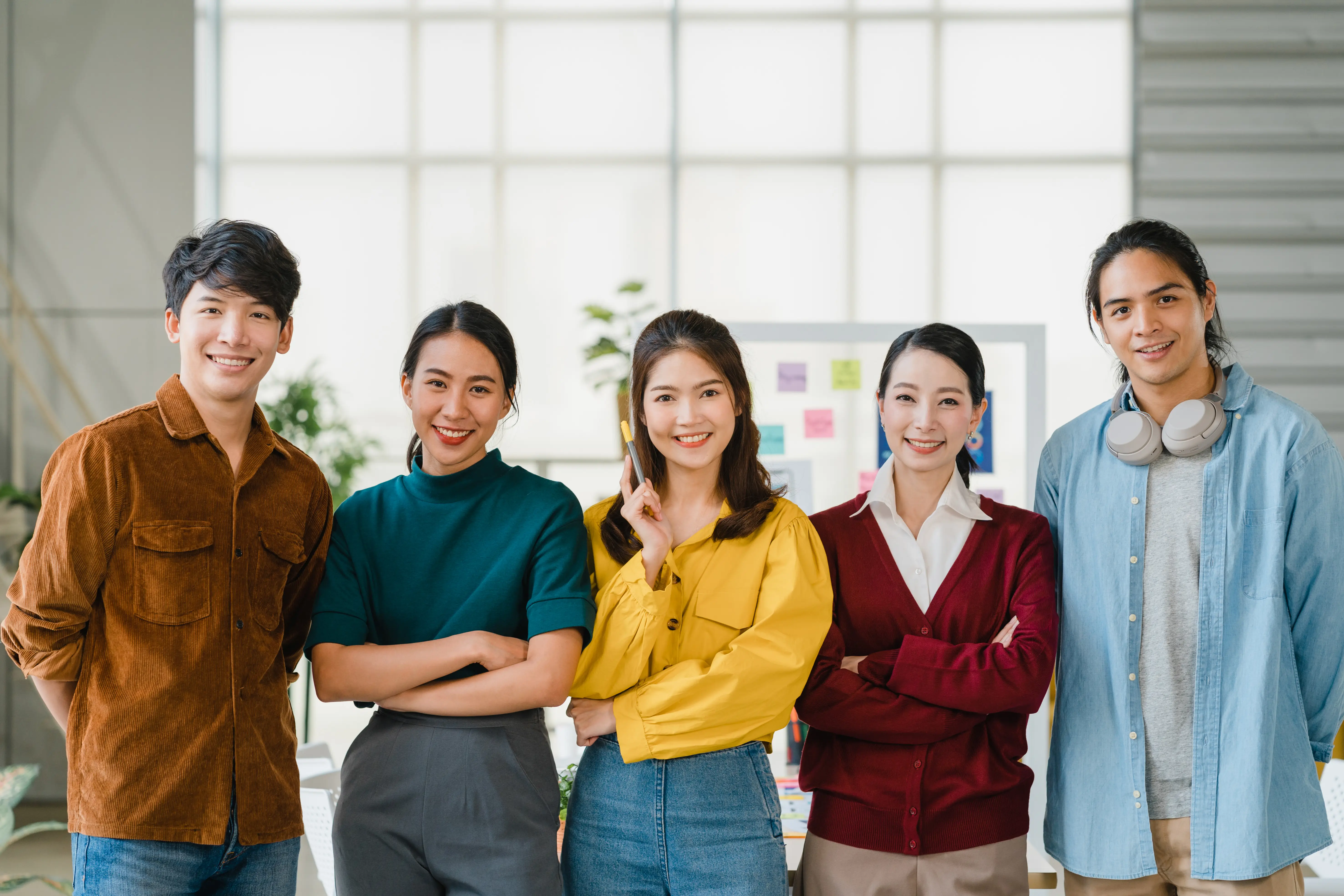 group-asia-young-creative-people-smart-casual-wear-smiling-arms-crossed-creative-office-workplace-diverse-asian-male-female-stand-together-startup-coworker-teamwork-concept (1)